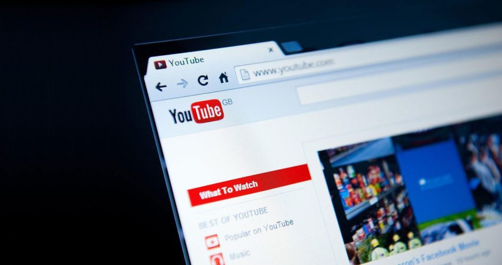 YouTube channels on a laptop screen